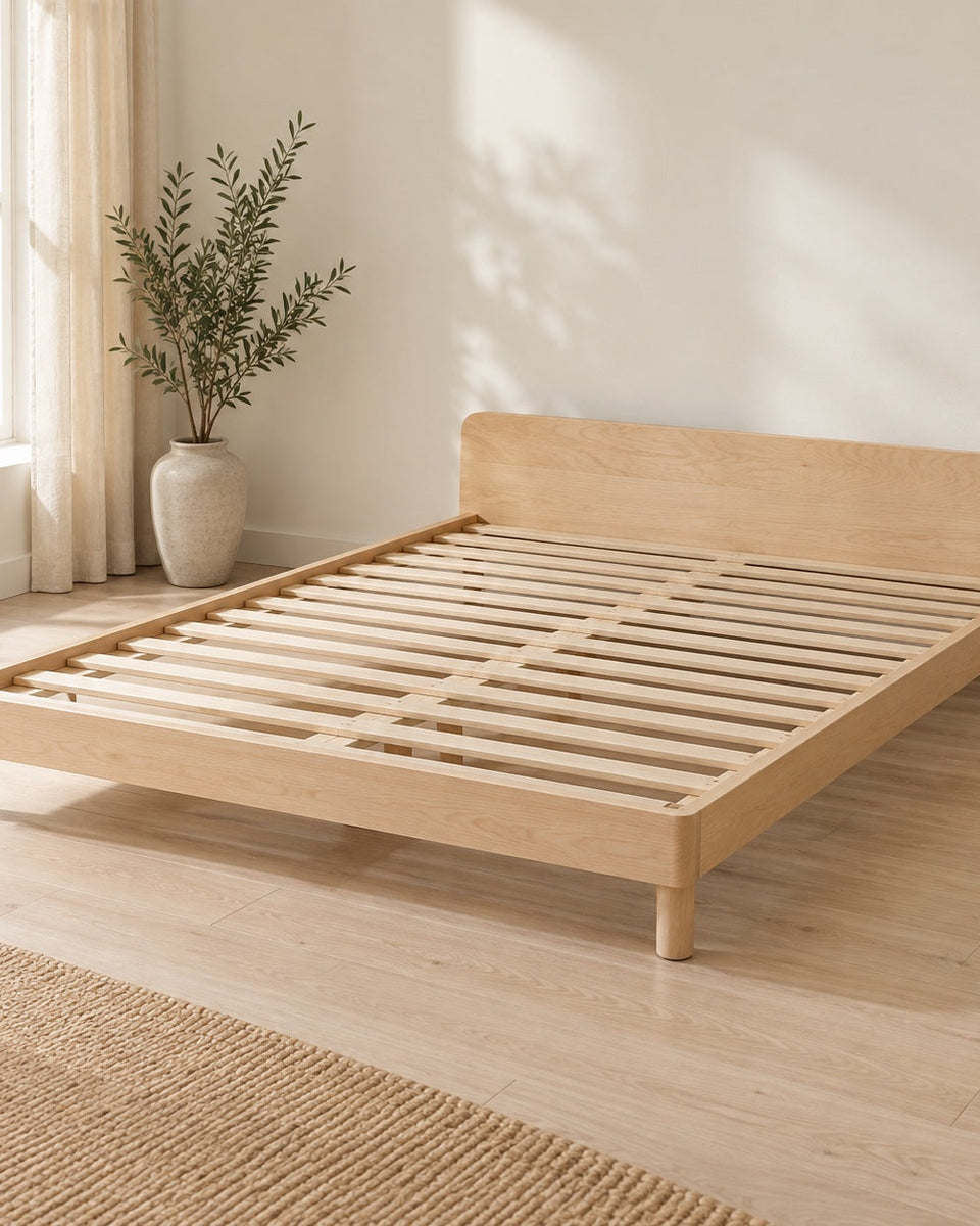 Birch bed frame with slatted base and low headboard